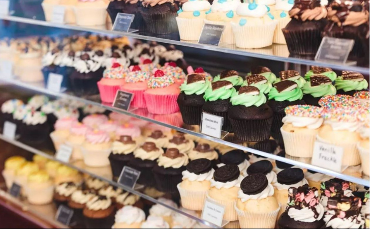 trays and trays and trays of colourful cupcakes