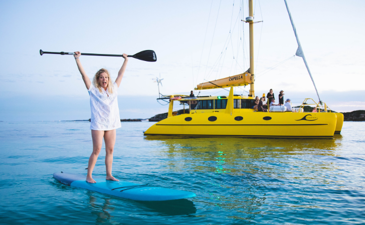 Charter 1 yellow catamaran 