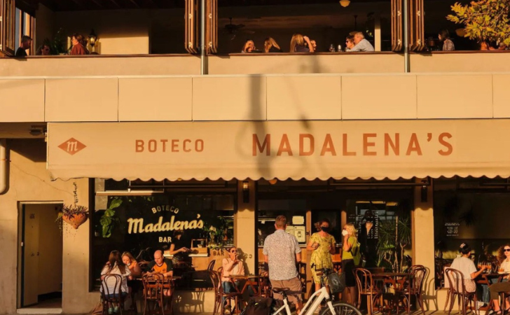 Crowd both upstairs and down at Madalena's at sunset