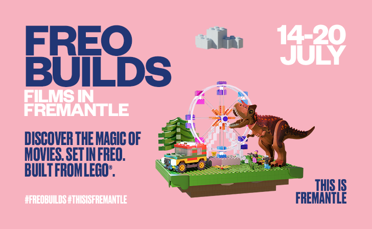 Pink poster with FREO BUILDS, FILMS IN FREMANTLE and a graphic showing a LEGO dinosaur with the Fremantle Ferris Wheel.