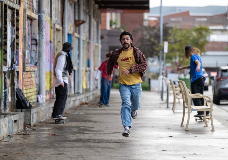 Charlie running outside Woolstores