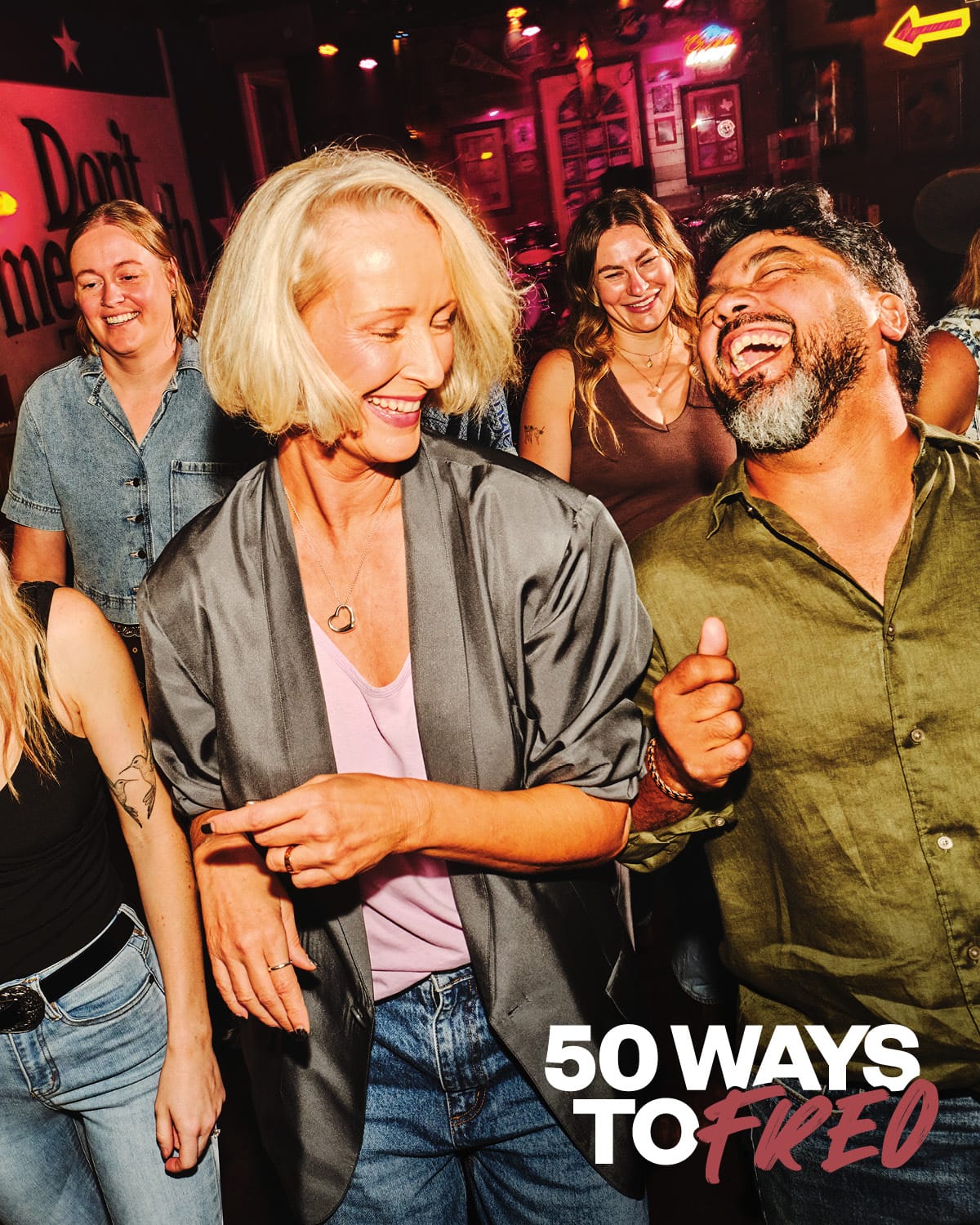 couple laughing in a bar