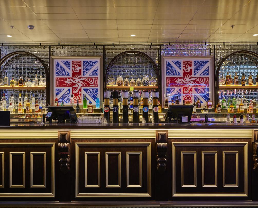 Bar at B. Lucky & Sons with spirit bottles on display 