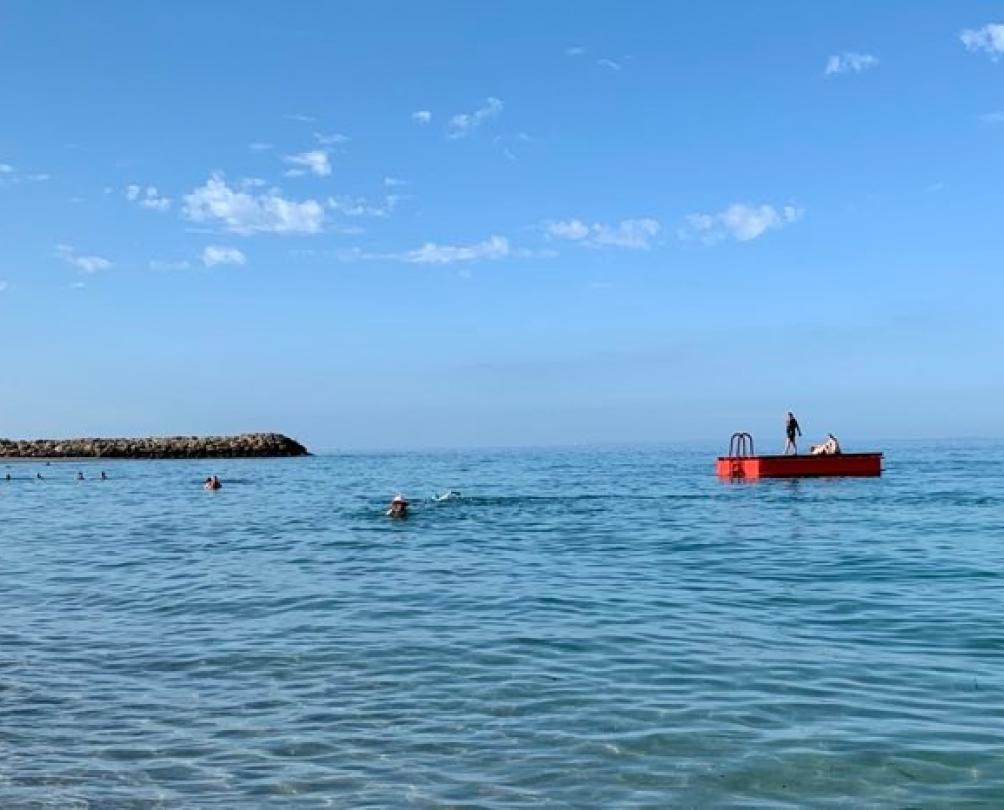 South Beach Blue ocean of South Beach with the red pontoon floating on the surface