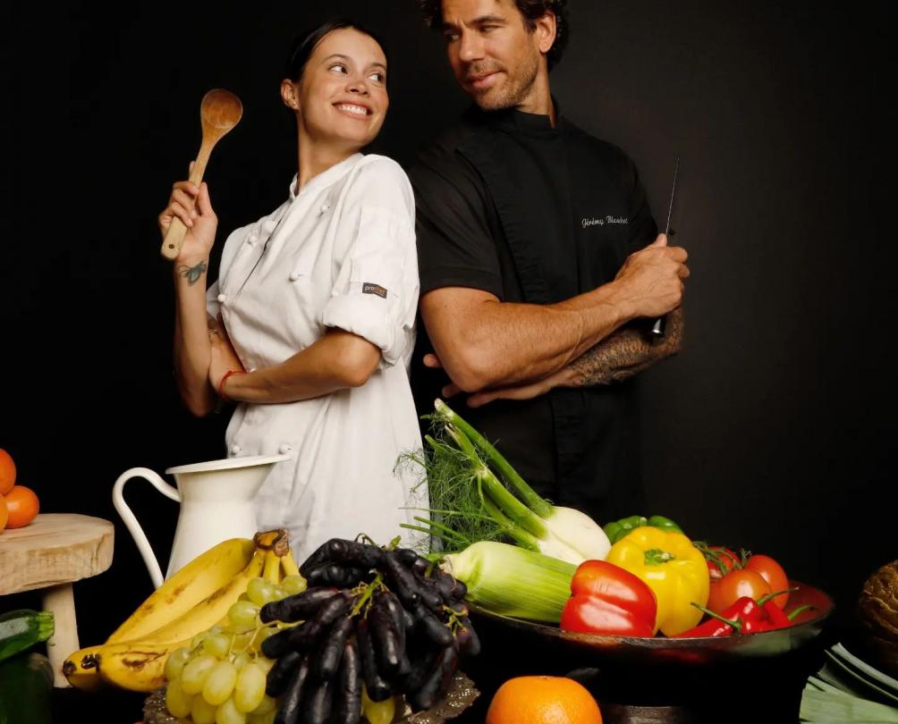 two chefs with fresh produce