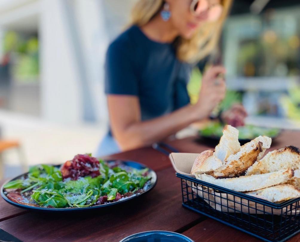 person eating a meal at table