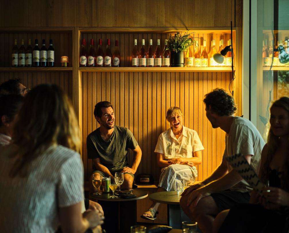 Group or men and women enjoying a drink at Al Lupo 