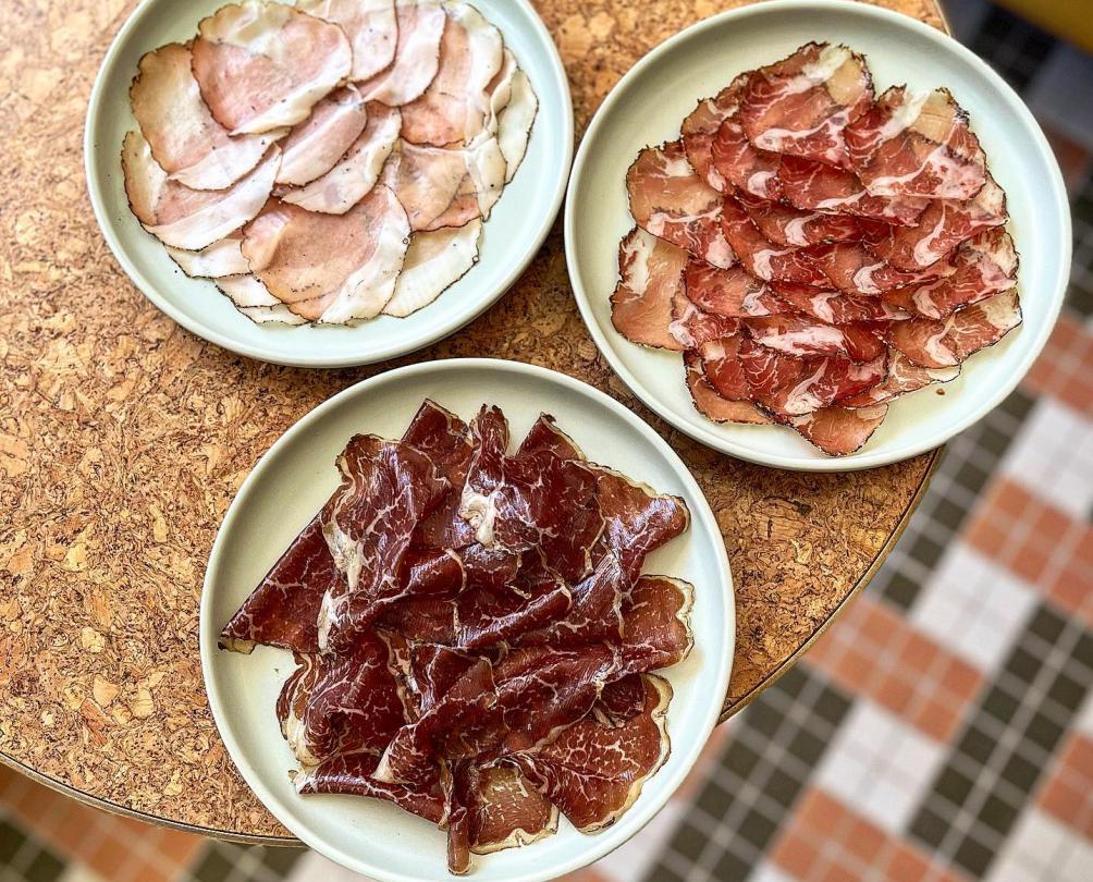 Plates of salumi at Vin Populi 