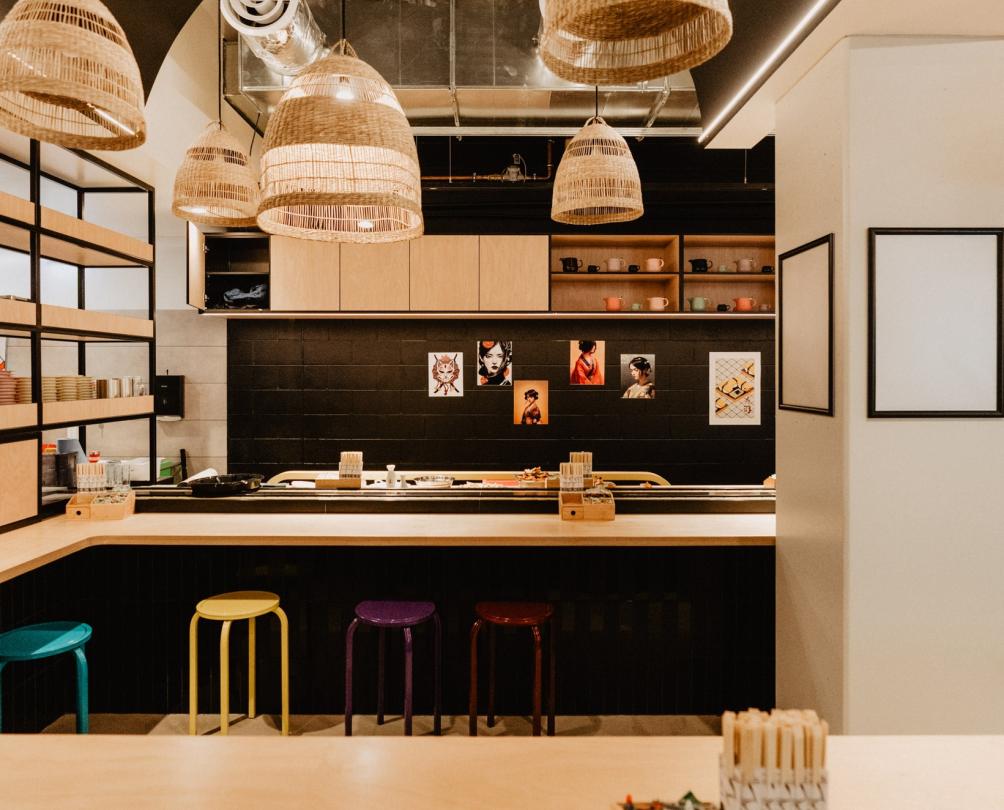 Fomoto Kaiten Sushi Fremantle internal fit out of shop with hanging lights and colourful stools