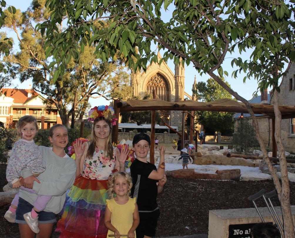 Fairy and group of children in front of the nature play area at Clancy's Fish Pub Fremantle