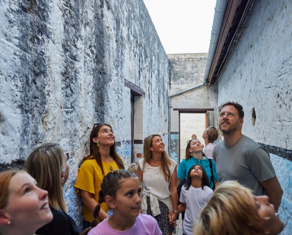 Children and adults at Fremantle Prison on a school holiday tour - captured by Jess Wyld