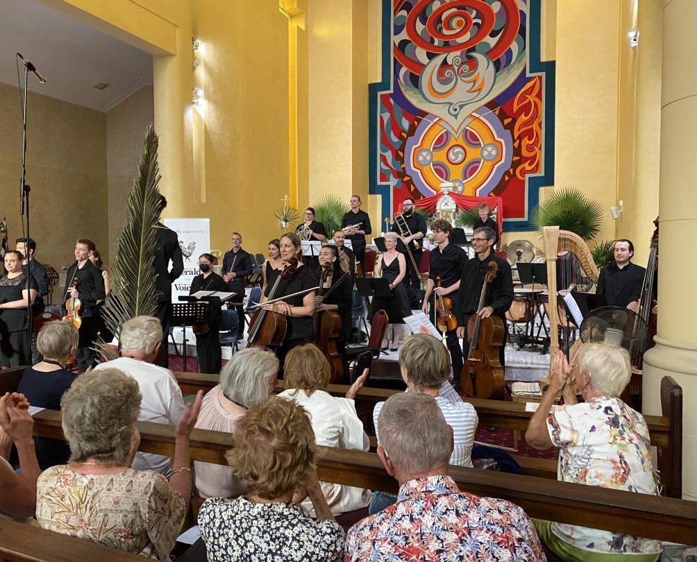 A classical music group performing in a church.