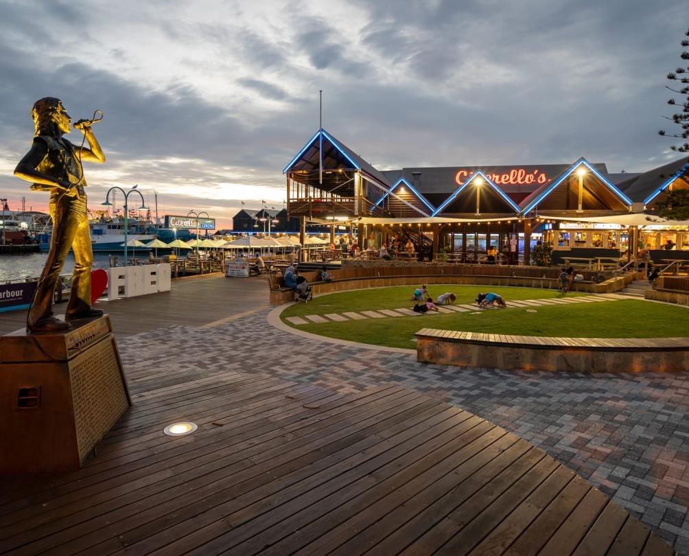 an image of the Bon Scott statue by Greg James at the Fishing Boat Harbour