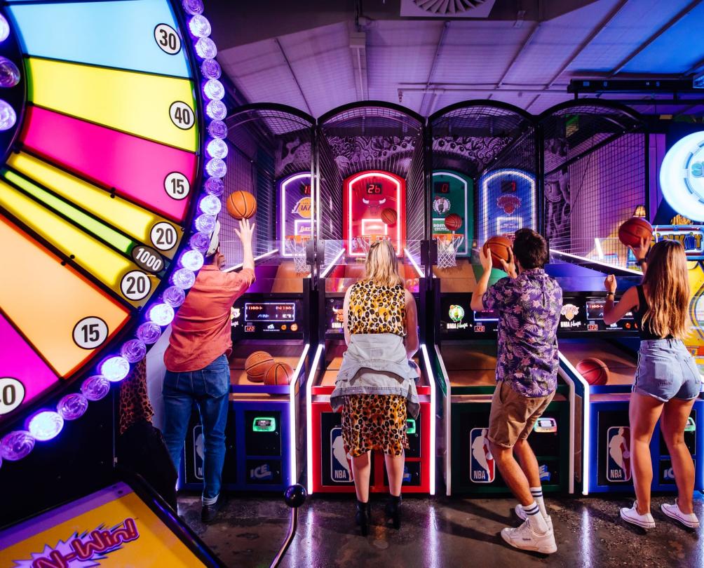 some kids playing at the Archie Brothers arcade at Fremantle FOMO