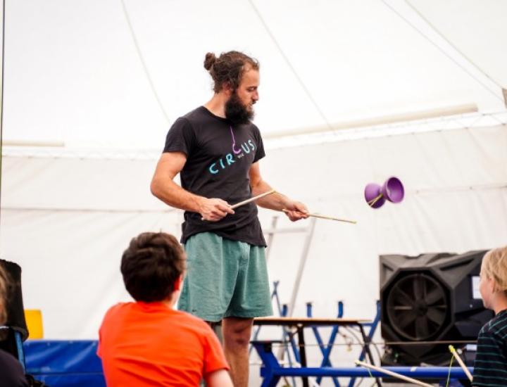 Circus WA kids course with Ben demonstrating Diabolo in Fremantle Big Top
