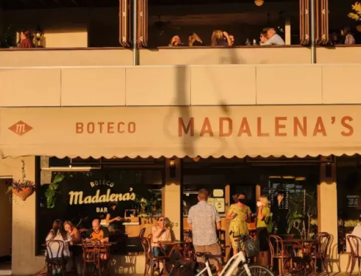 Crowd both upstairs and down at Madalena's at sunset
