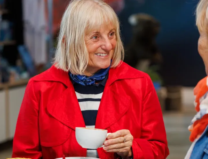 a woman having a coffee with friends at the WA Maritime Museum 